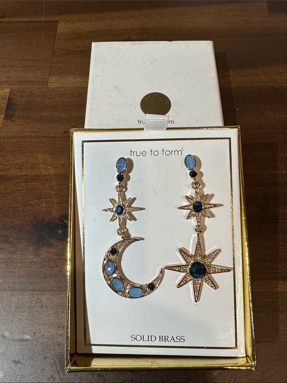 True to Form Gold Moon & Star Drop Earrings with Blue Stones
